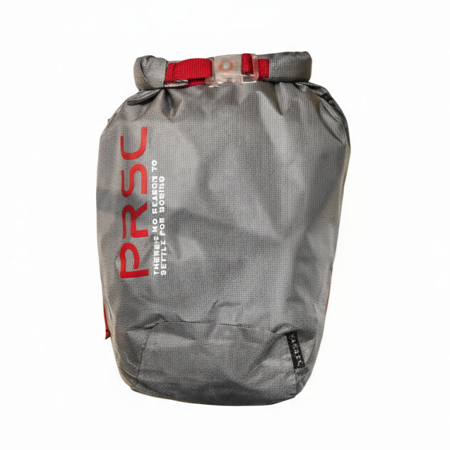 A gray and red Polaris dry bag with a gray and red buckle, made of a gray and red fabric with 'Polaris' branding on the side.